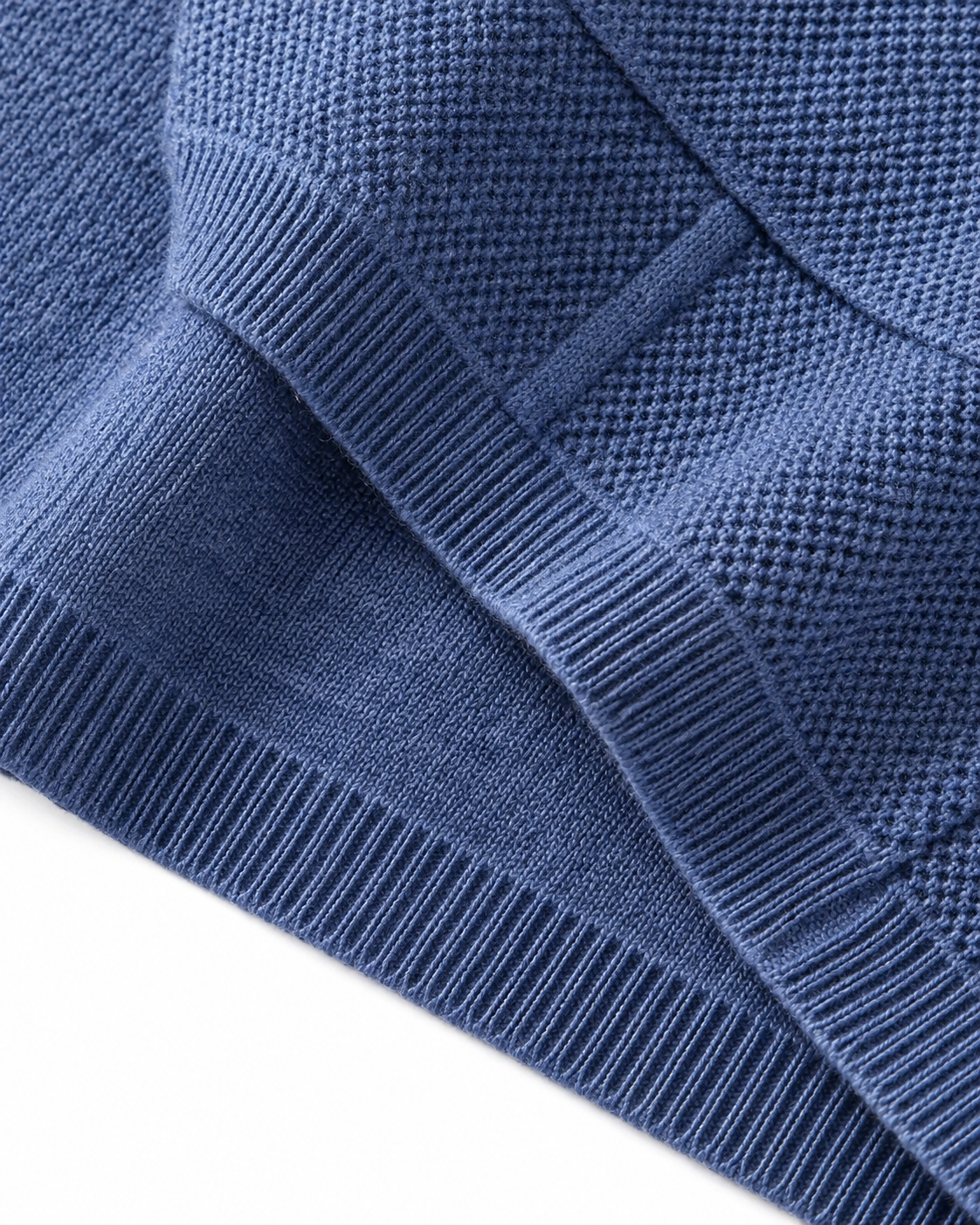 Close-up of the shoulder and sleeve knit on the merino overshirt