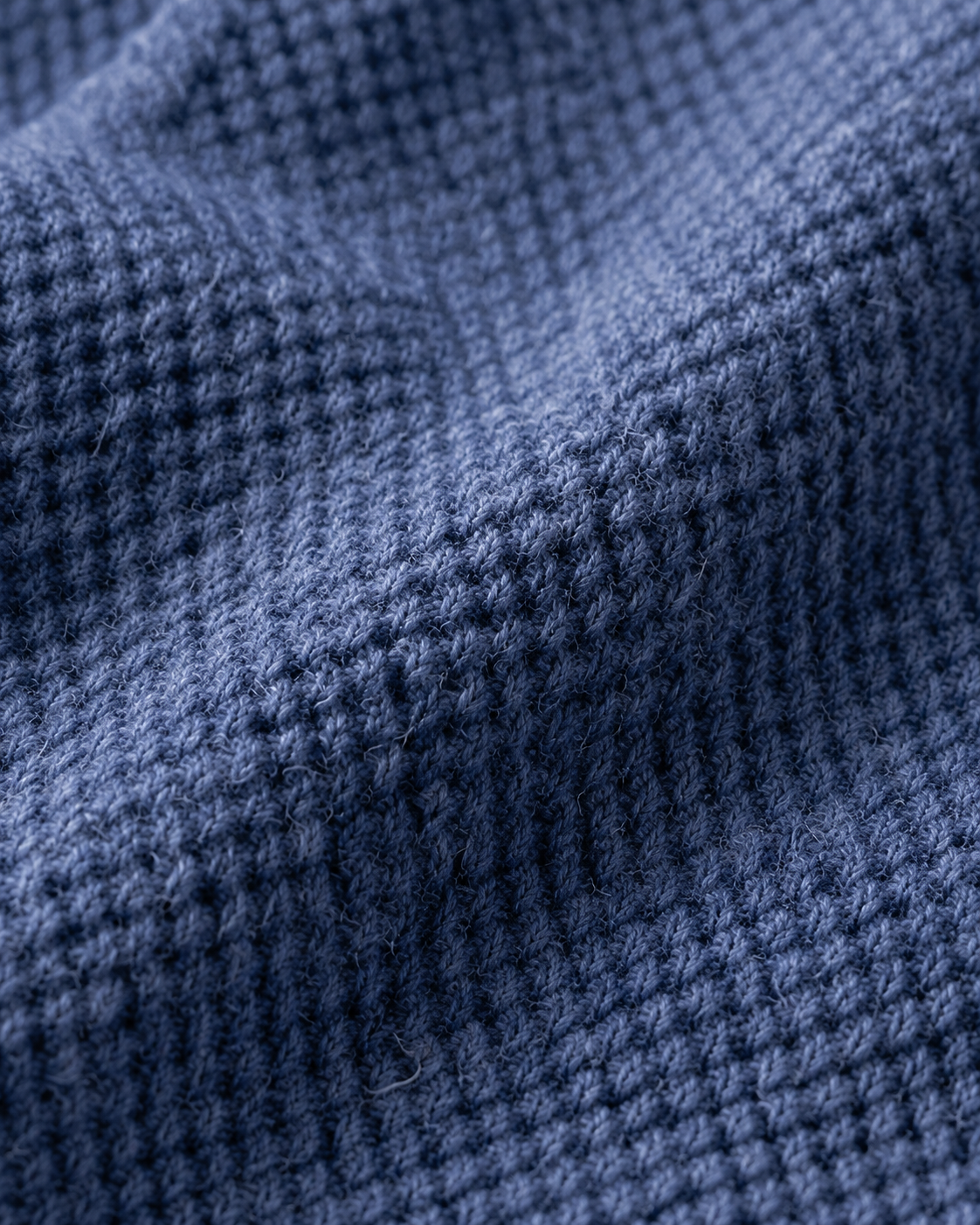 Close-up of the merino wool knit texture of the overshirt